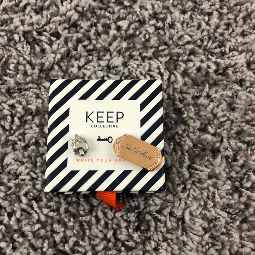 Two KEEP jewelry pieces.